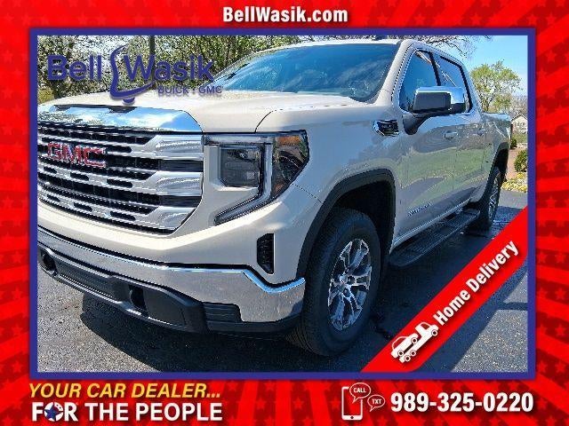2026 GMC Sierra 1500 SLE in Coastal Dune — front three-quarter view