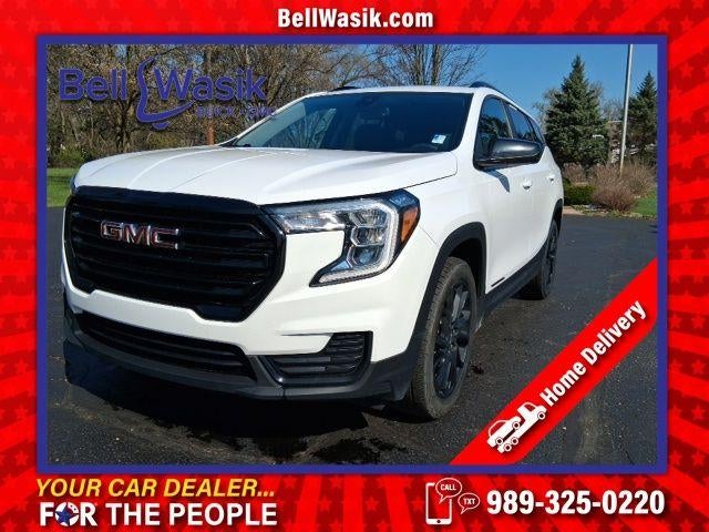 2023 GMC Terrain SLE in Summit White — front three-quarter view